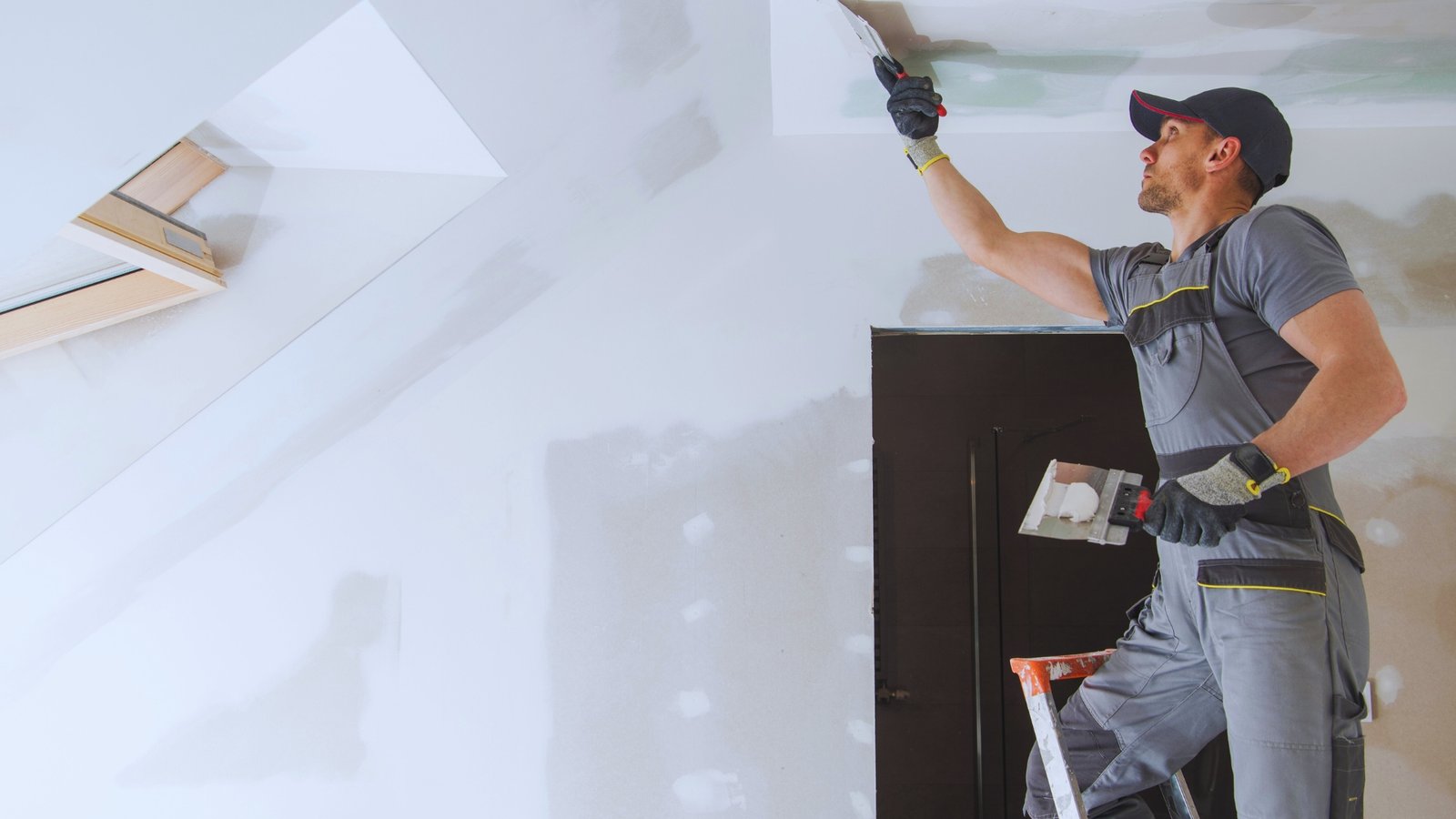 Interior painting in progress as part of a building refresh or renovation project.